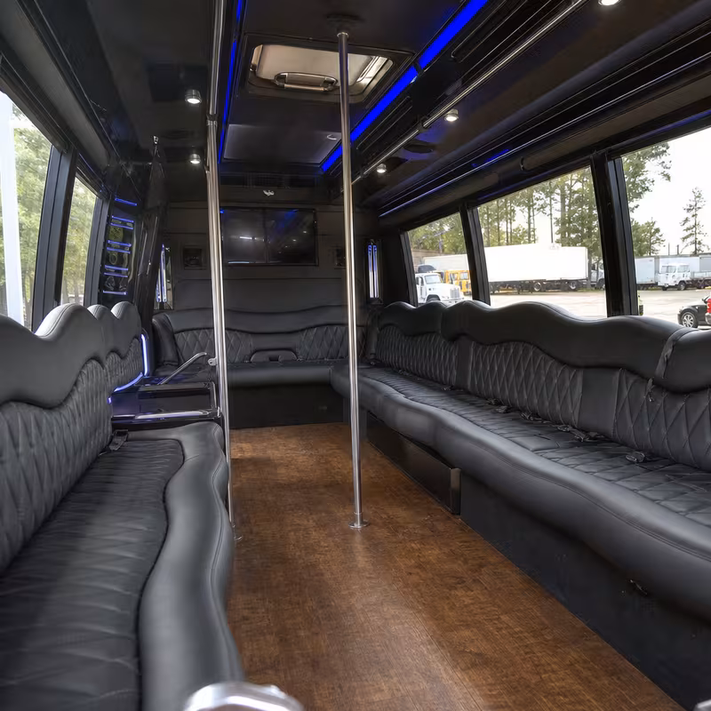 Friends laughing during a Indianapolis party bus celebration