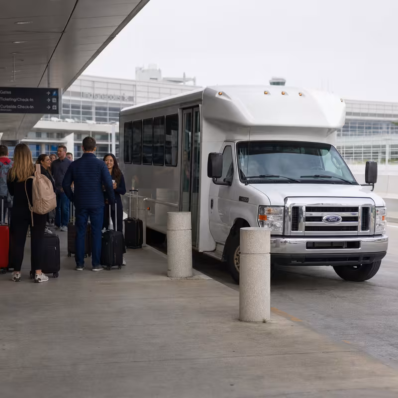 Black Mercedes Sprinter van staged for an Indianapolis Airport Transportation group