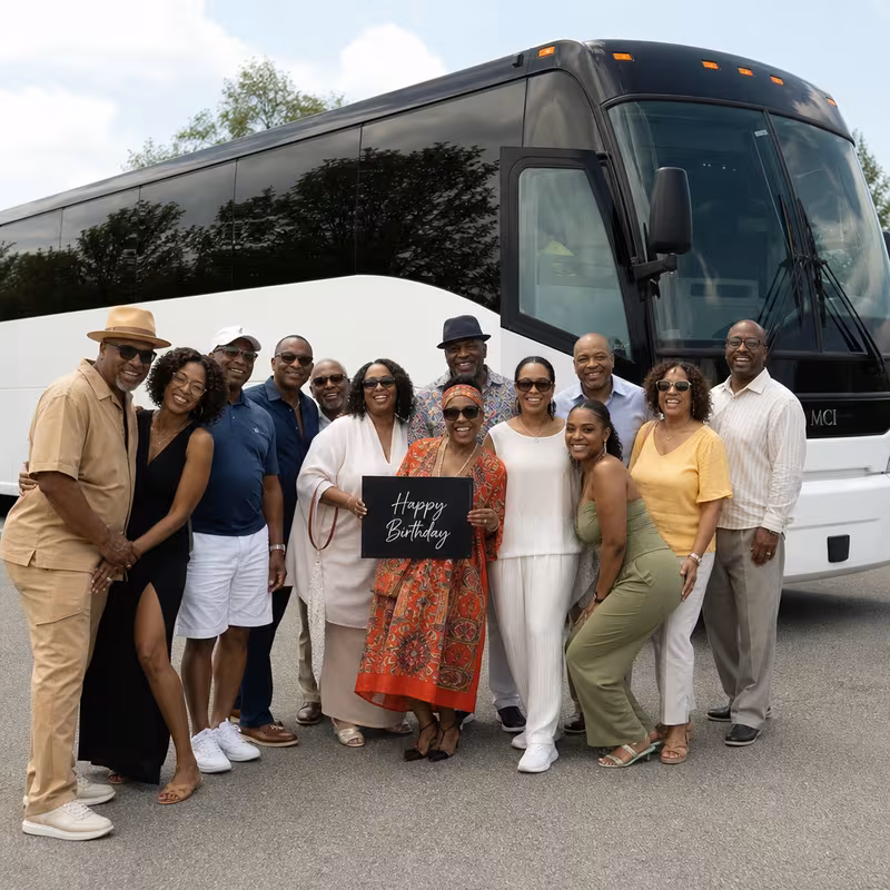 Passengers loading luggage while boarding an Indianapolis group shuttle